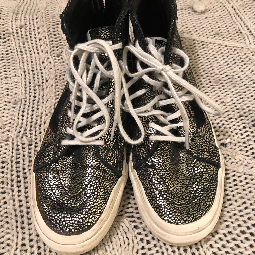 Black and gold suede high top Vans